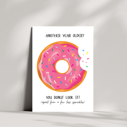 Funny Donut Birthday Card – “Another Year Older? You Donut Look It!” – Pun Humour Card for Friends & Family