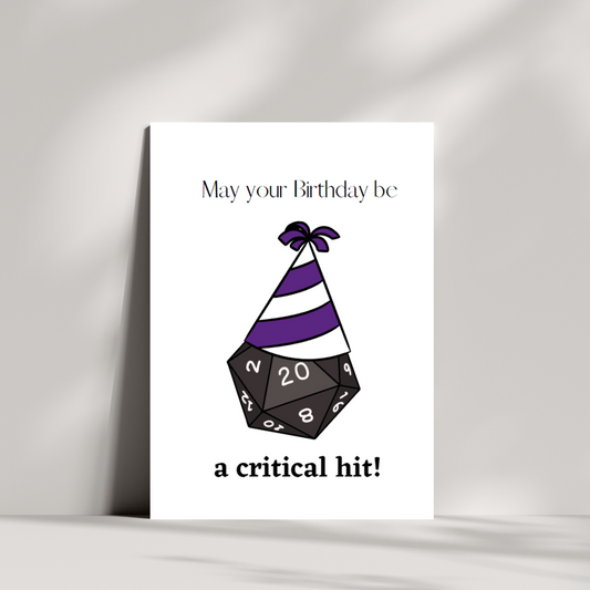 May your birthday be a critical hit birthday card - D20 wearing party hat birthday card
