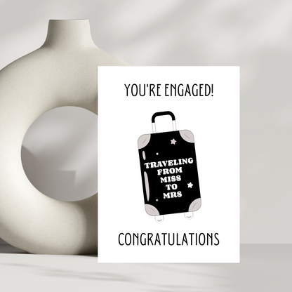 You're engaged congratulations engagement card, travelling from Miss to Mrs